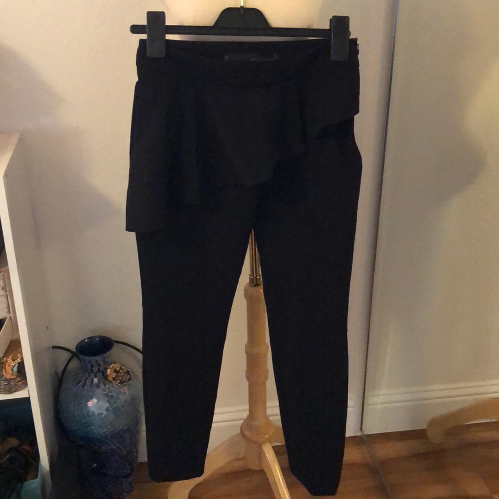 zara black skinny pants with ruffle skirt